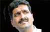 Saffron row in Congress : Ashraf takes on Poojari